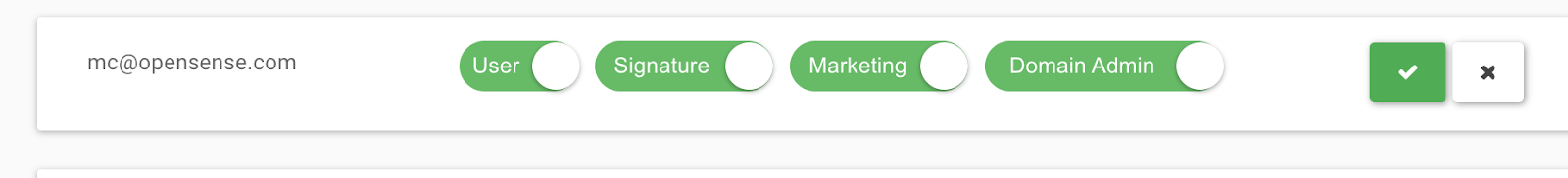 A user row in edit mode with the User, Signature, Marketing, and Domain Admin toggles all on, and the check and X buttons