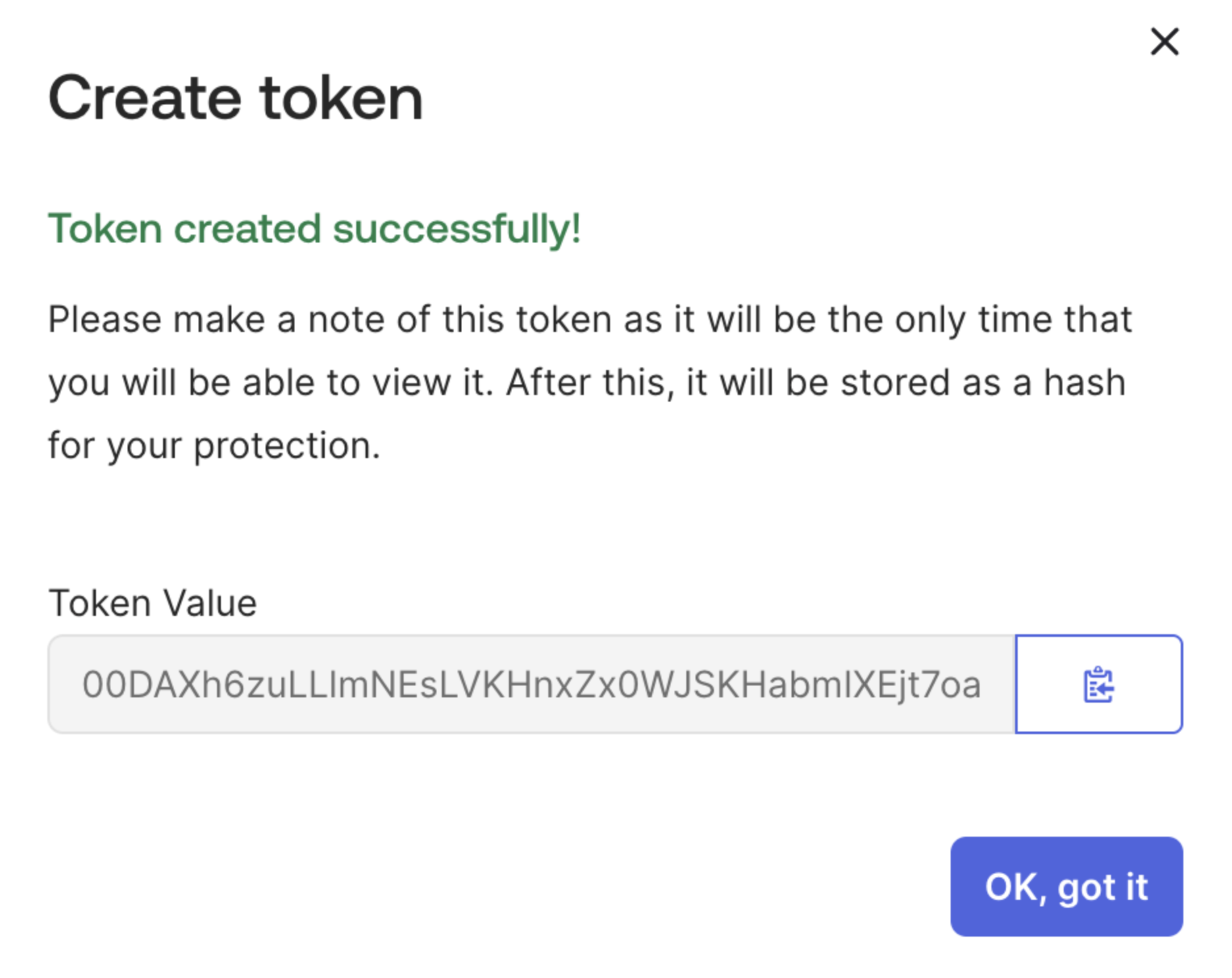 The Okta Token created successfully dialog, with the Token Value and its copy icon
